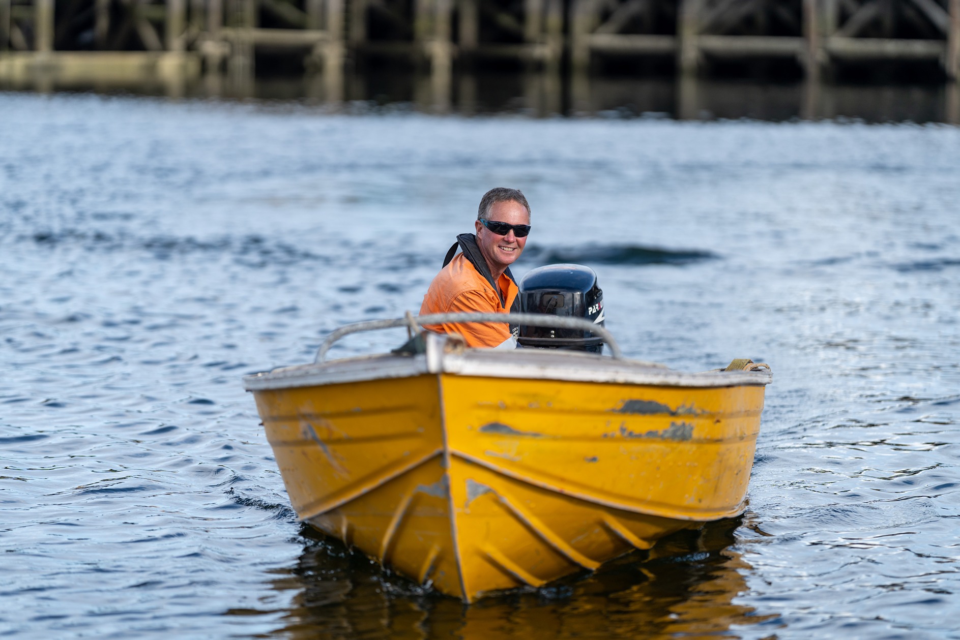 Yellow boat driving towards ramp