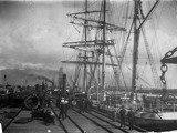 Historic picture of large ship in port